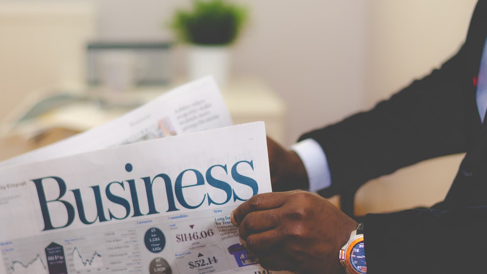 Business charts and financial documents being reviewed